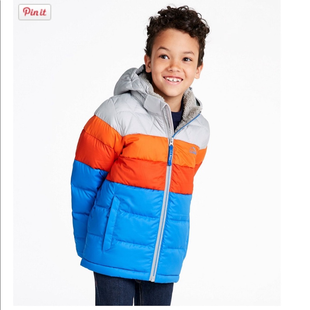 Boys puffer jacket. Still in stores. No flaws like new size 10-12